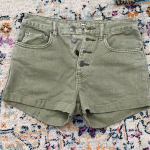 Forest green billabong shorts.